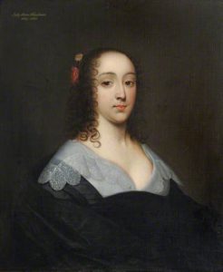 a portrait of a woman in the tradition clothing and hairstyle of 16rh century England.