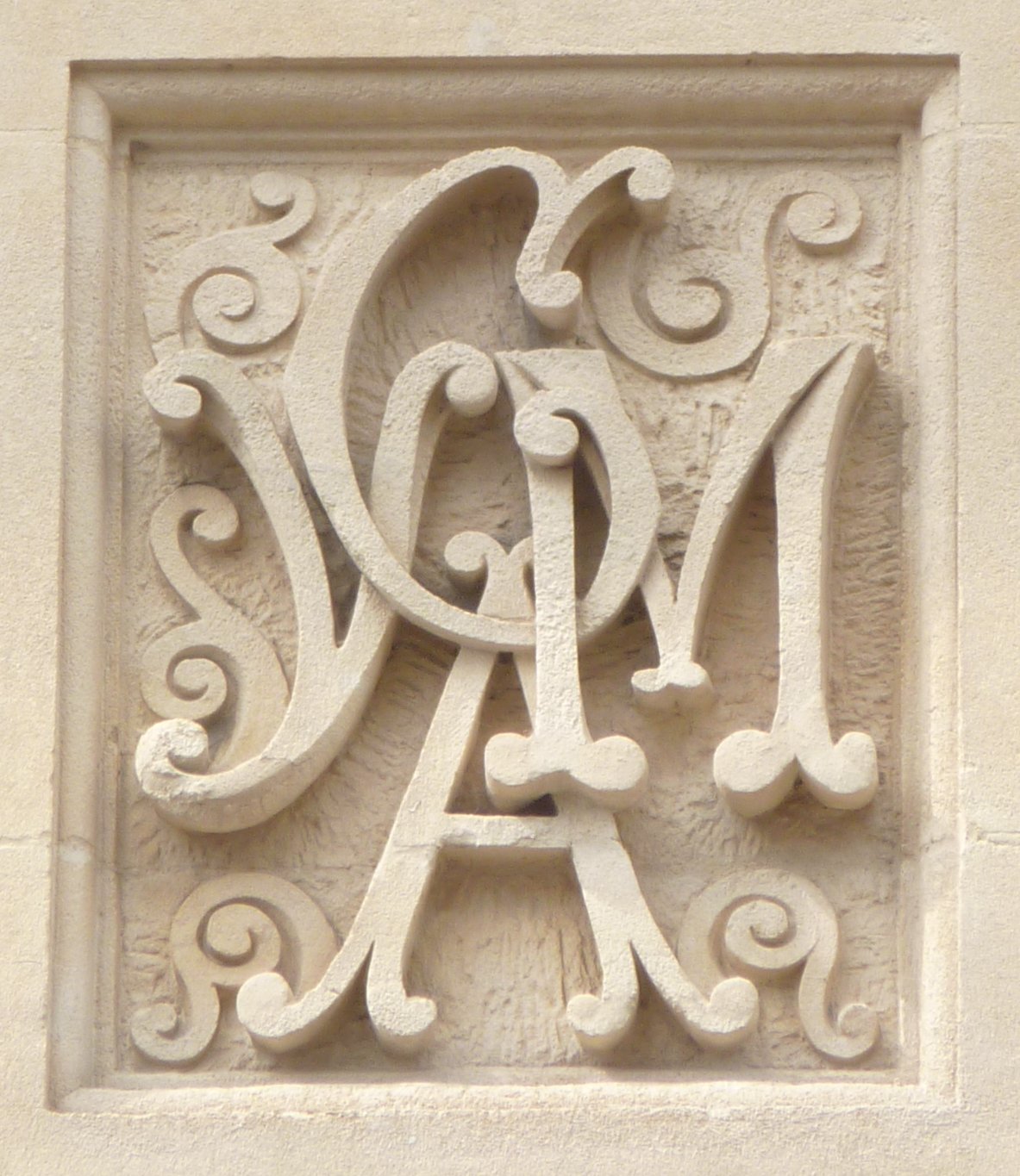 Letters carved into building