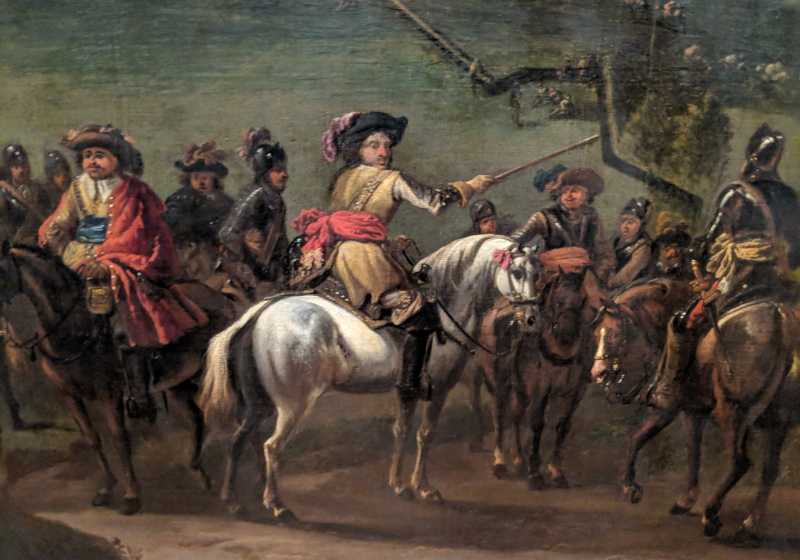 Part of a painting showing a Cavalier general astride a white horse, wielding a sword. He is surrounded by other royalist troops, infantry and cavalry.