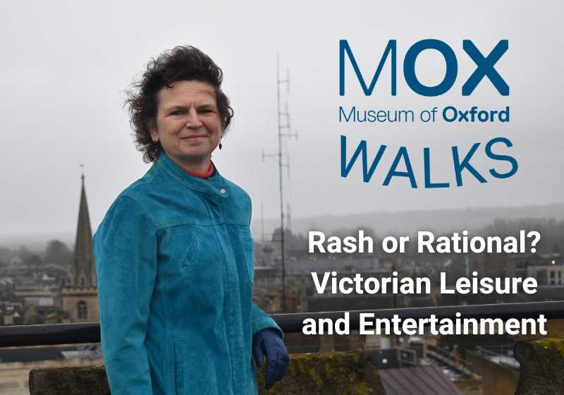 Liz Woolley stands in front of a view of Oxford's skyline on a cloudy day. She has a light skin-tone and short, brown curly hair. She is wearing a teal-coloured jacket. Next to her text reads: 'Museum of Oxford Walks. Rash or Rational? Victorian Leisure and Entertainment'.