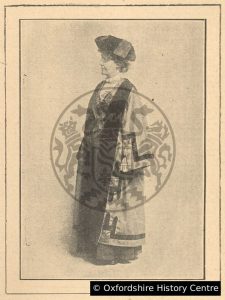 Black and white photograph of a woman wearing official municipal councillor robes.