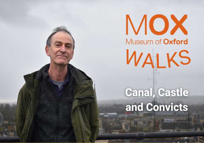 Mark Davies stands against the Oxford skyline on a grey day. Text next to him reads 'Museum of Oxford Walks: Canal, Castle and Convicts'.