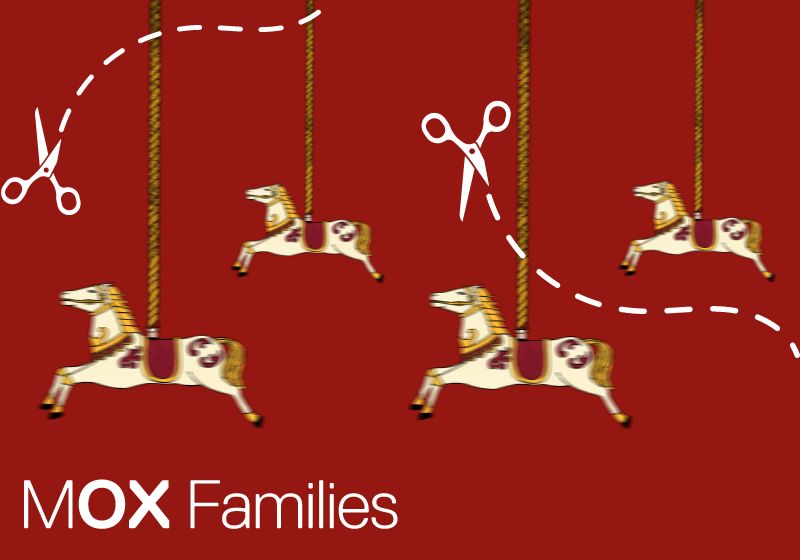 Four carousel horse dash across the screen, blurred as they move. Two scissors chop at each corner of the red background.